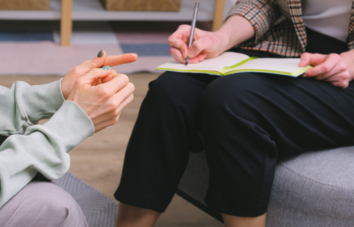 Doctor meeting with patient.